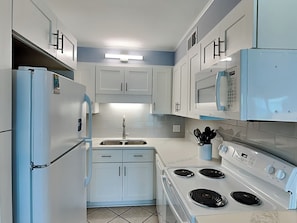 Fridge, microwave, oven, stovetop - Summit Beach Resort #604 | Beach Service Included! (Panama City Beach)