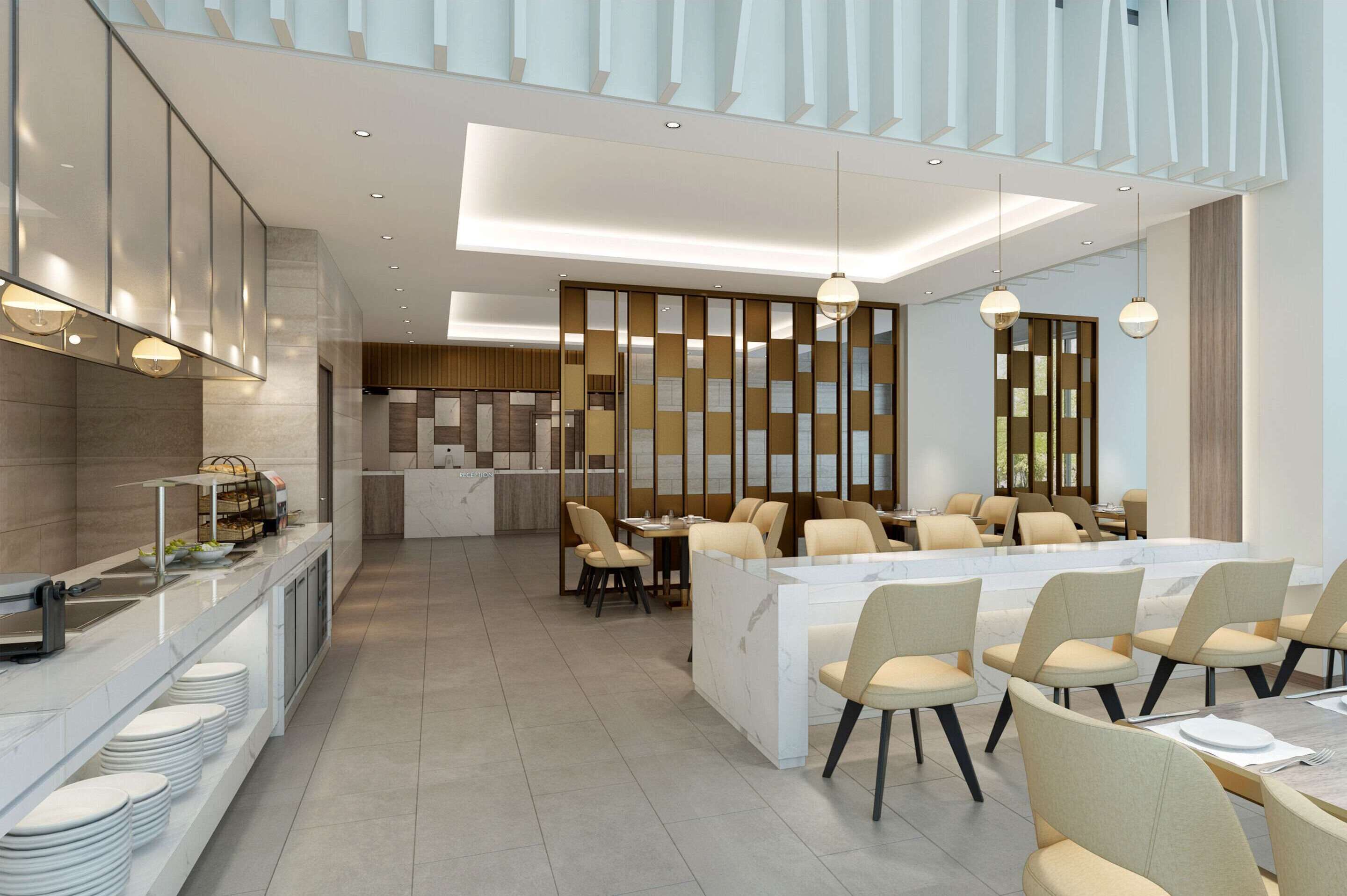 A modern hotel lobby with a reception desk, seating area, and a large dining table.