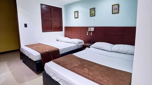 A hotel room with two beds, a wooden headboard, a small desk, and a wall-mounted shelf. - Casa Art Gallery, Cartagena Historic Center (Cartagena de Indias)