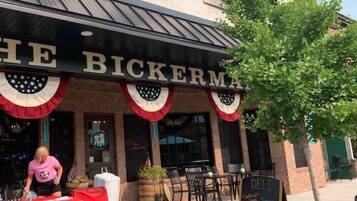 A restaurant named 'The Bickerman' with outdoor seating and a chalkboard menu.