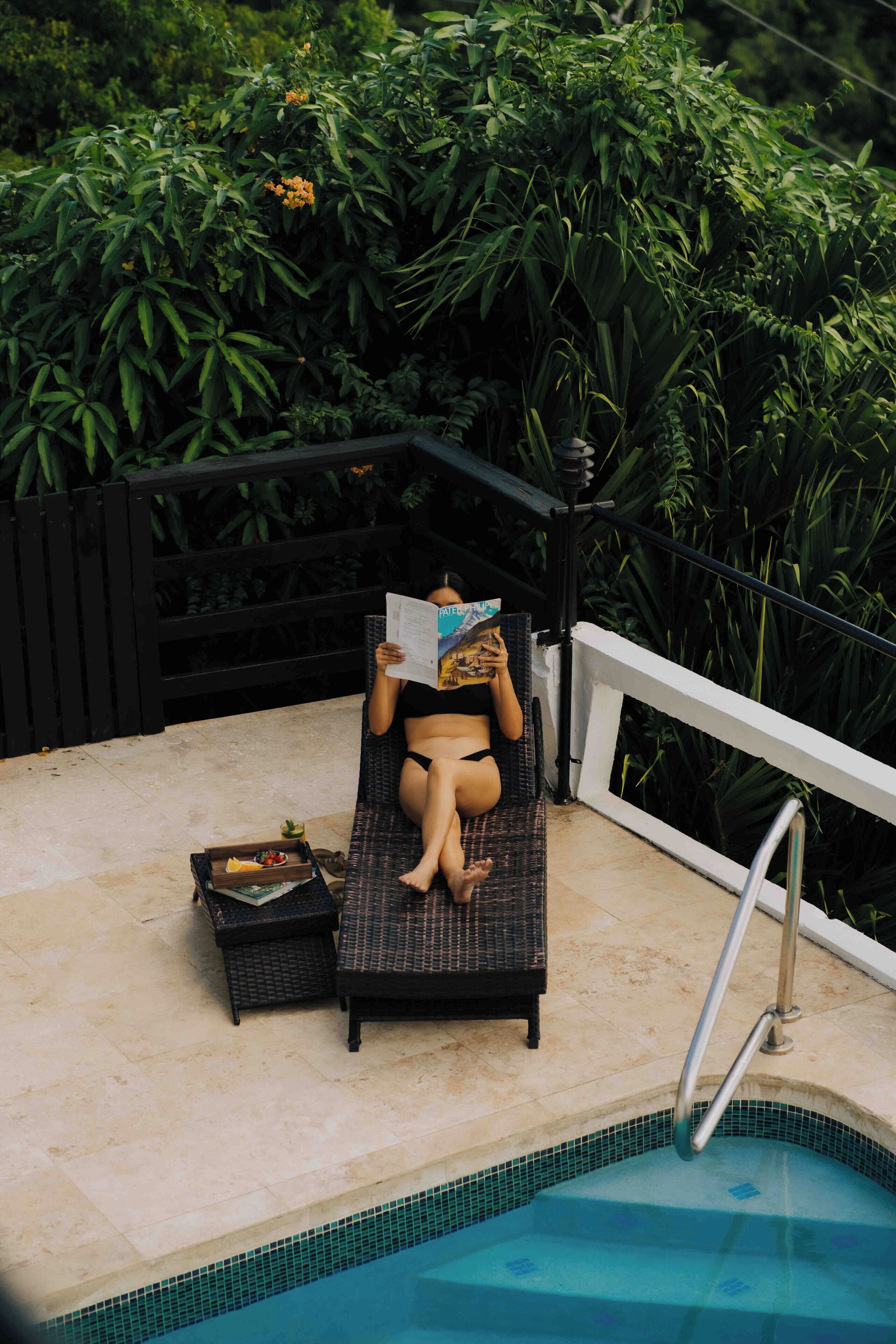 Outdoor pool, open 6:00 AM to 10:00 PM, pool loungers