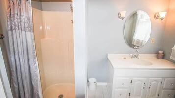 Shower, towels, soap, toilet paper