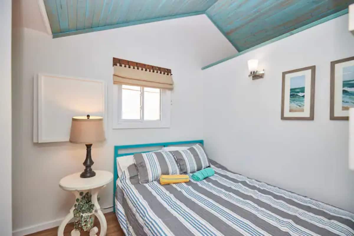 Premium bedding, pillow-top beds, laptop workspace