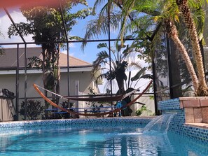 Outdoor pool, a heated pool - Luxury home with heated pool & hottub! Close to golf, beach, & amusement parks. (Lakeland)