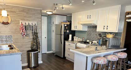 Cozy, private, rustic-modern cabin, a doorway to fine fishing and lake fun!