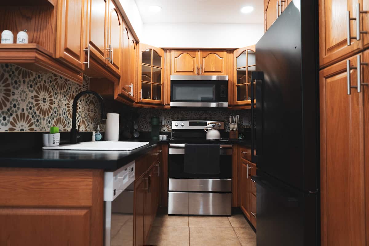 Exclusive Apartment | Private kitchen | Full-size fridge, microwave, oven, stovetop