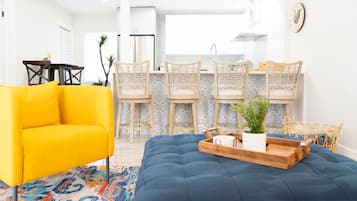 Deluxe Apartment | Living area | 55-inch Smart TV with digital channels, TV, smart speakers