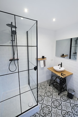 Shower, towels, soap, toilet paper