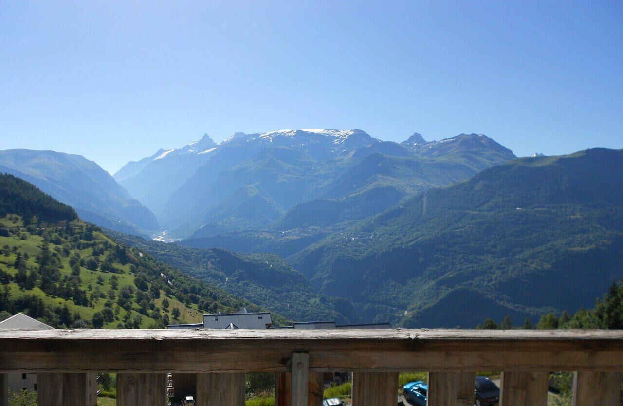 A mountain landscape with a clear sky.