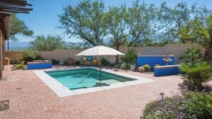 A swimming pool with a pergola, a covered seating area, and a view of trees and mountains. - Green Valley, Gorgeous Mtn Views, Private pool (Green Valley)