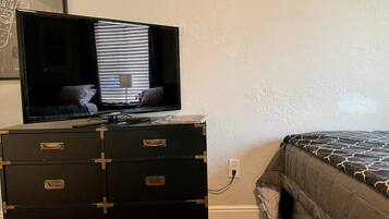 Iron/ironing board, travel crib, WiFi, bed sheets