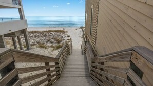 A wooden staircase leading to a beach with a view of the ocean. - BEACH HOUSE! Walk to Private Beach Gate, Pickleball, Rent Golf Cart, Heated Pool (Destin)