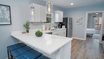 House (4 Bedrooms) | Private kitchen | Microwave, oven, dining tables