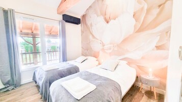Habitación Deluxe con 1 cama doble o 2 individuales, Aire acondicionado | Ropa de cama de alta calidad, wifi gratis, ropa de cama