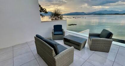 Waterfront terrace apartment in Porticcio