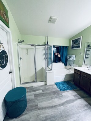 Shower, hair dryer, towels, soap