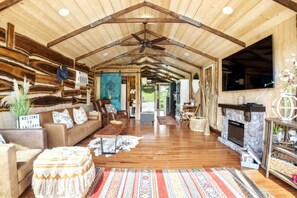 TV, fireplace, books, stereo