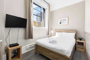 1 habitación, tabla de planchar con plancha, wifi y ropa de cama 