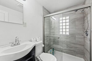 Shower, hair dryer, towels, soap