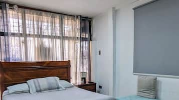 1 habitación, tabla de planchar con plancha, wifi gratis y ropa de cama