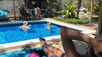 Outdoor pool, free pool cabanas, pool umbrellas