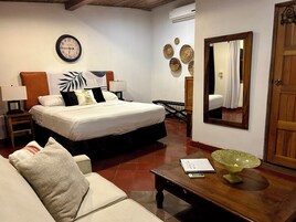 Deluxe Room, 1 King Bed, Patio, Pool View | Premium bedding, pillowtop beds, individually decorated