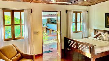 Deluxe Room, 1 Queen Bed, Garden View, Courtyard Area | Premium bedding, pillowtop beds, individually decorated