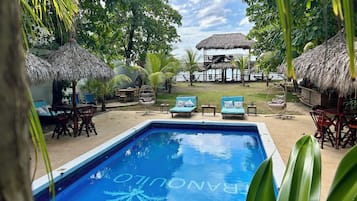 Outdoor pool, free pool cabanas, pool umbrellas