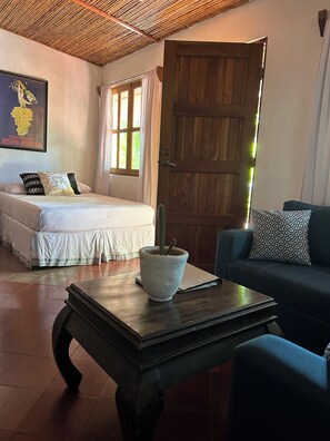 Deluxe Room, 2 Double Beds, Courtyard View, Garden Area | Premium bedding, pillowtop beds, individually decorated - Hotel Tranquilo (León)