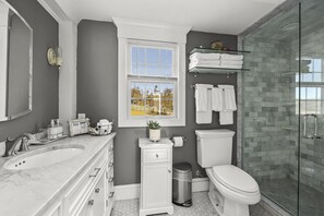 Shower, hair dryer, towels, soap