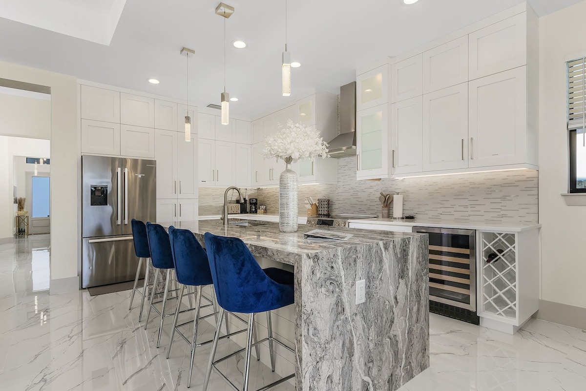 Photo 12 of New Villa! Close to the 🏖️! Heated Pool/Spa, Lanai, Grill, EV🔌! Two King beds!