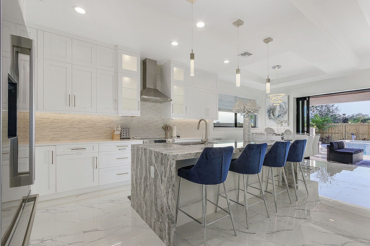 Photo 11 of New Villa! Close to the 🏖️! Heated Pool/Spa, Lanai, Grill, EV🔌! Two King beds!