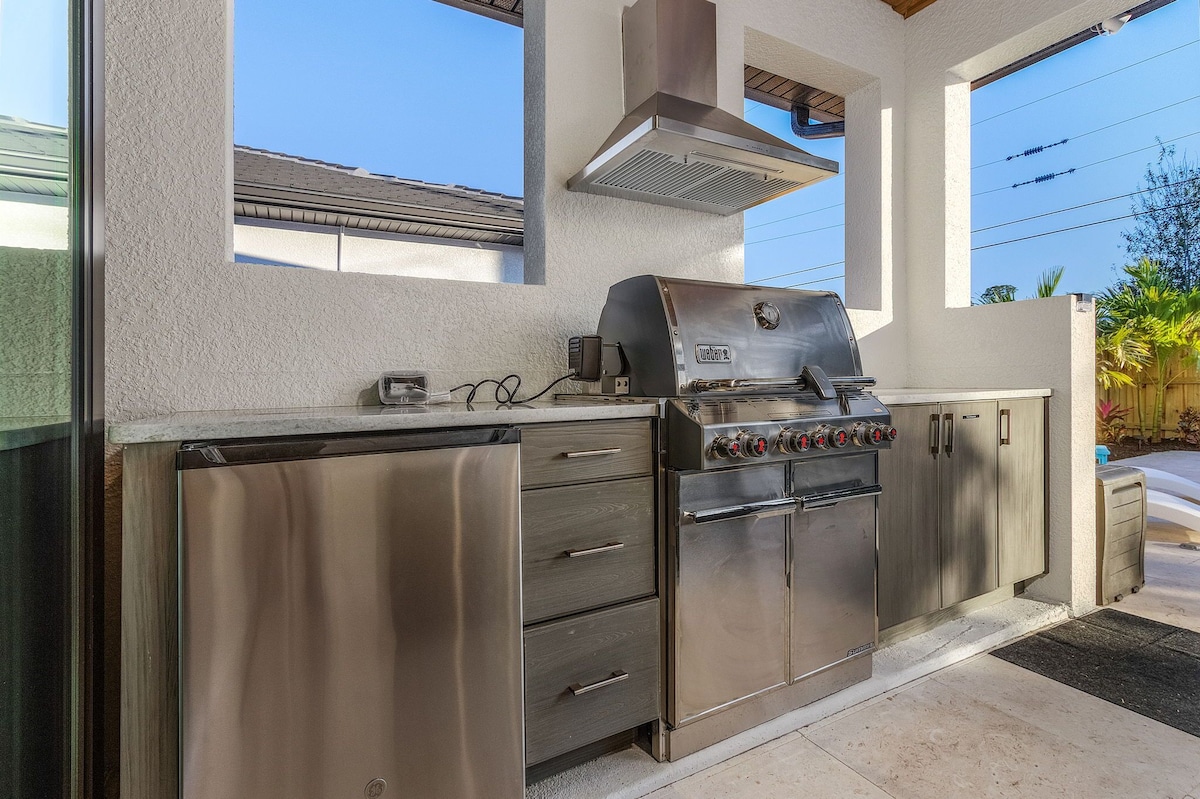 Photo 29 of New Villa! Close to the 🏖️! Heated Pool/Spa, Lanai, Grill, EV🔌! Two King beds!