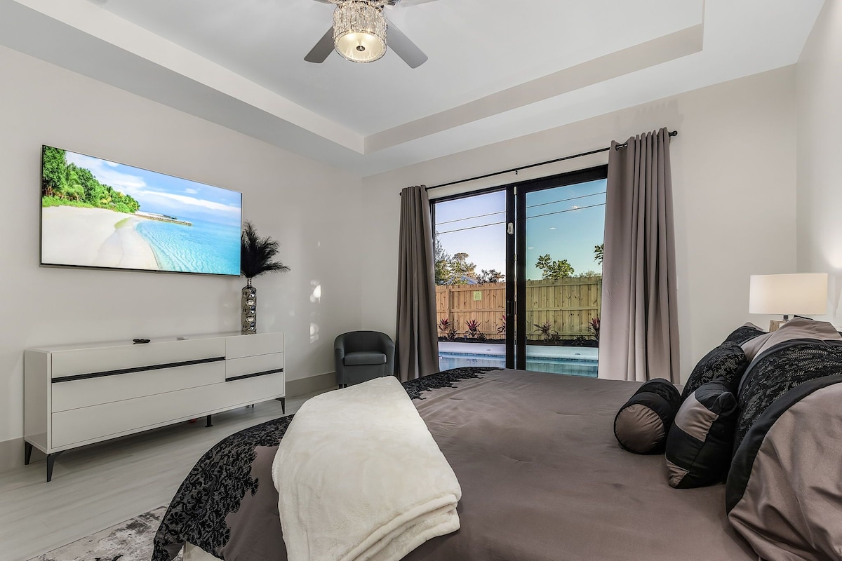 Photo 15 of New Villa! Close to the 🏖️! Heated Pool/Spa, Lanai, Grill, EV🔌! Two King beds!