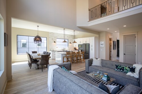 Lakeshore Modern!  Lake front with platform dock and 2 kayaks, firepit and views