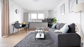 Panoramic Apartment | Living area | TV