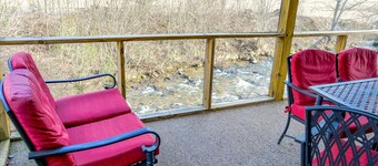 Creek-side home with private hot tub, game room, firepit, deck & mountain view