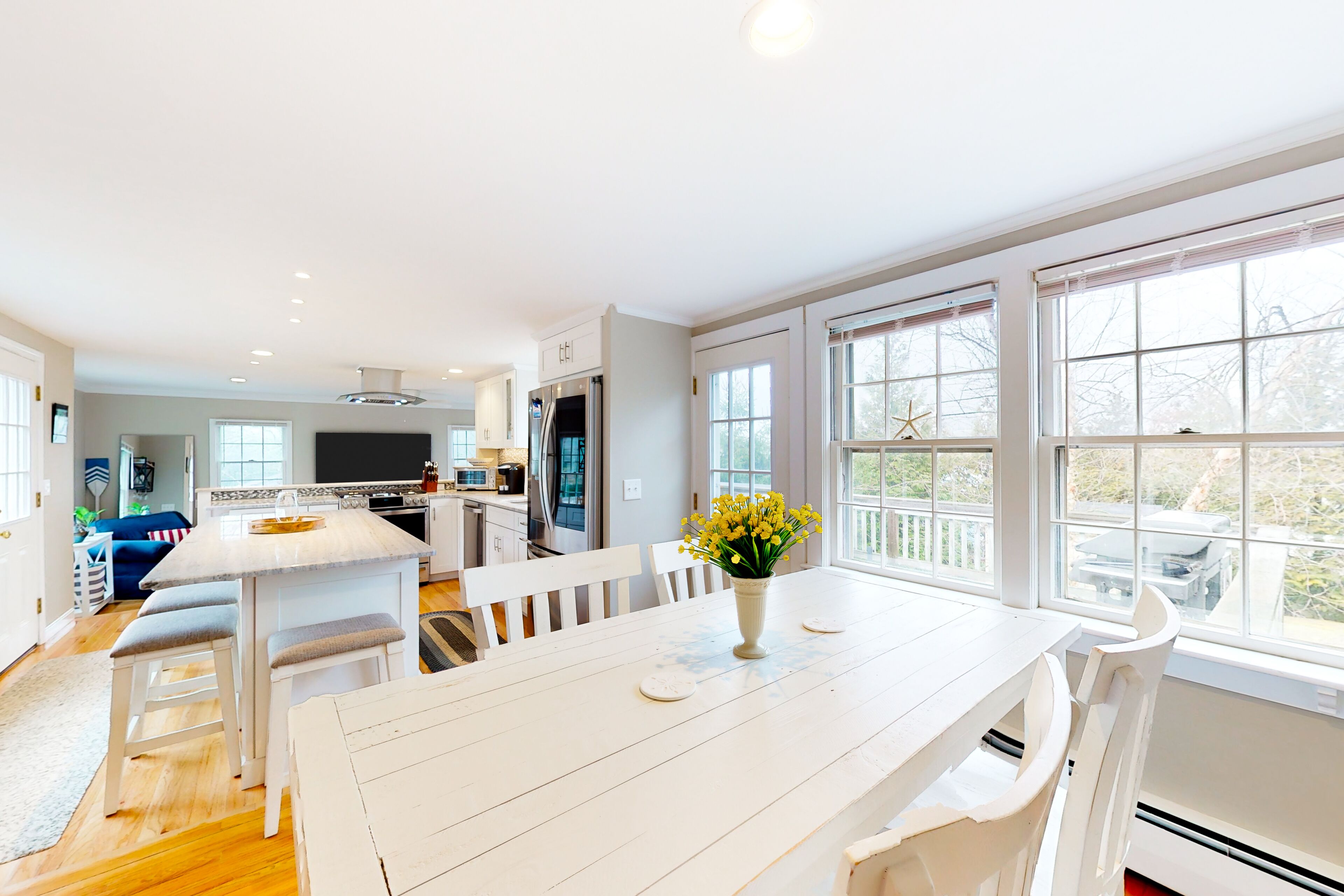 Sunny, Cape-style home with a game room, yard, firepit, & washer/dryer