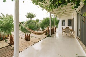Outdoor dining - Villa Olympia - a palm trees paradise in front of the sea. (Heraklion Crete)