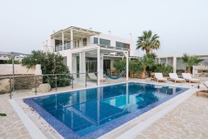 Outdoor pool, a heated pool - Villa Olympia - a palm trees paradise in front of the sea. (Heraklion Crete)