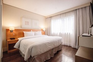 Apartamento superior | 1 quarto, cofres nos quartos, cortinas blackout, Wi-Fi de cortesia