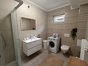 Shower, hair dryer, towels, soap