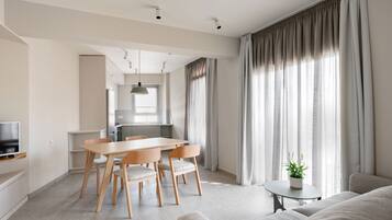 Big One Bedroom Apartment H | Living area | 42-inch Smart TV with digital channels, TV