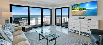 Updated direct oceanfront 2/2 with a balcony, beachfront heated pool and beach access