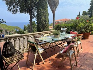 Outdoor dining - Villa Capo d'Arco with sea view, in an exclusive location inside the Residence with use of pools and (Rio Marina)