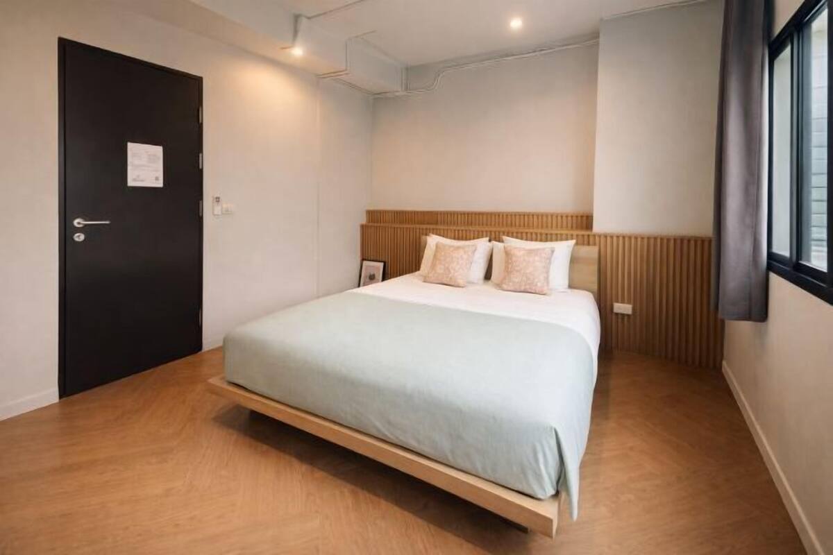 Premium bedding, pillow-top beds, free minibar, laptop workspace