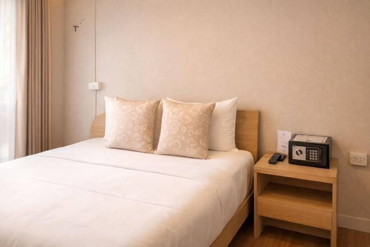 Premium bedding, pillow-top beds, free minibar, laptop workspace
