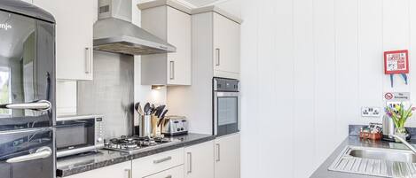 Refrigerador, horno, placa de cocina, tostadora