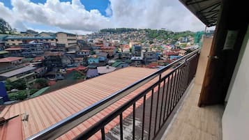 Deluxe Triple Room, Refrigerator, City View | Terrace/patio