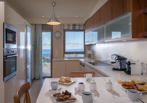 Luxury Villa | Private kitchen | Full-sized fridge, microwave, oven, stovetop